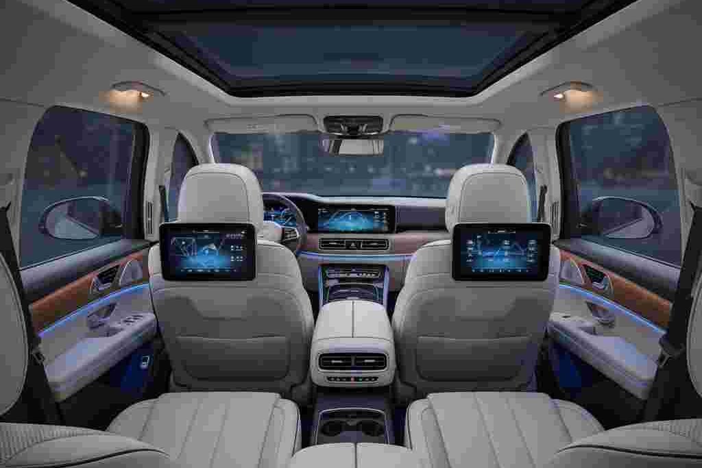 Spacious interior of luxury SUV with leather seats and ambient lighting